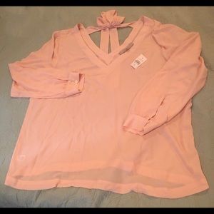 Peach/pink colored blouse